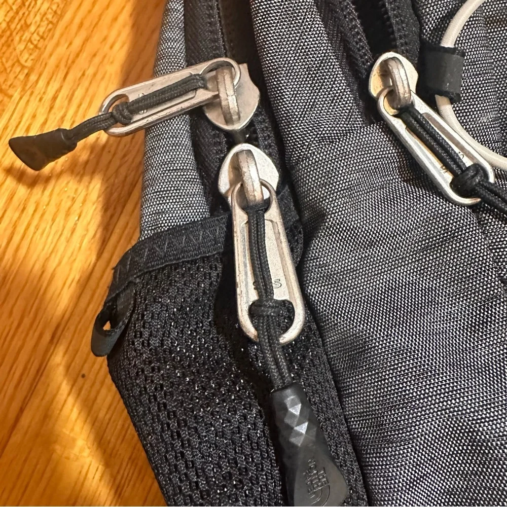 The North Face Jester Backpack  Everyday Travel Pack Black Gray Silver Hardware